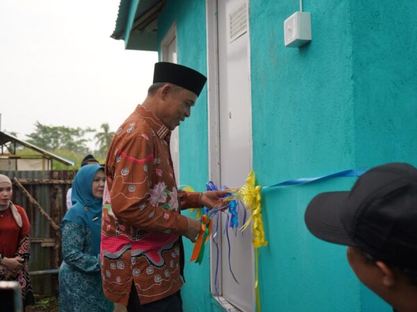 Milad Ke-61 Inhil, Bupati Herman Hadirkan Jamban Sehat Percontohan di Ponpes Daarul Rahman